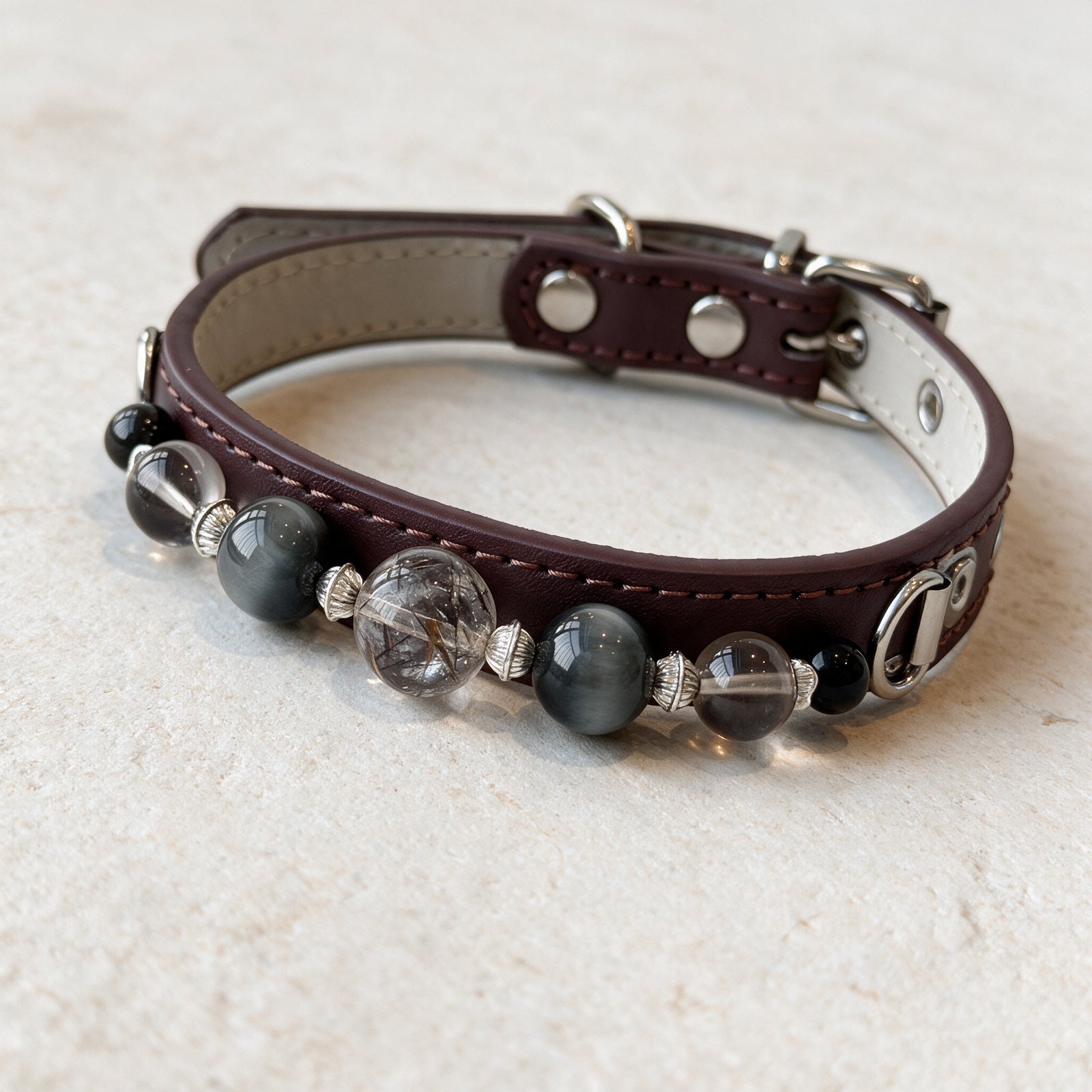 A close view of the Midnight Compass beads and fittings