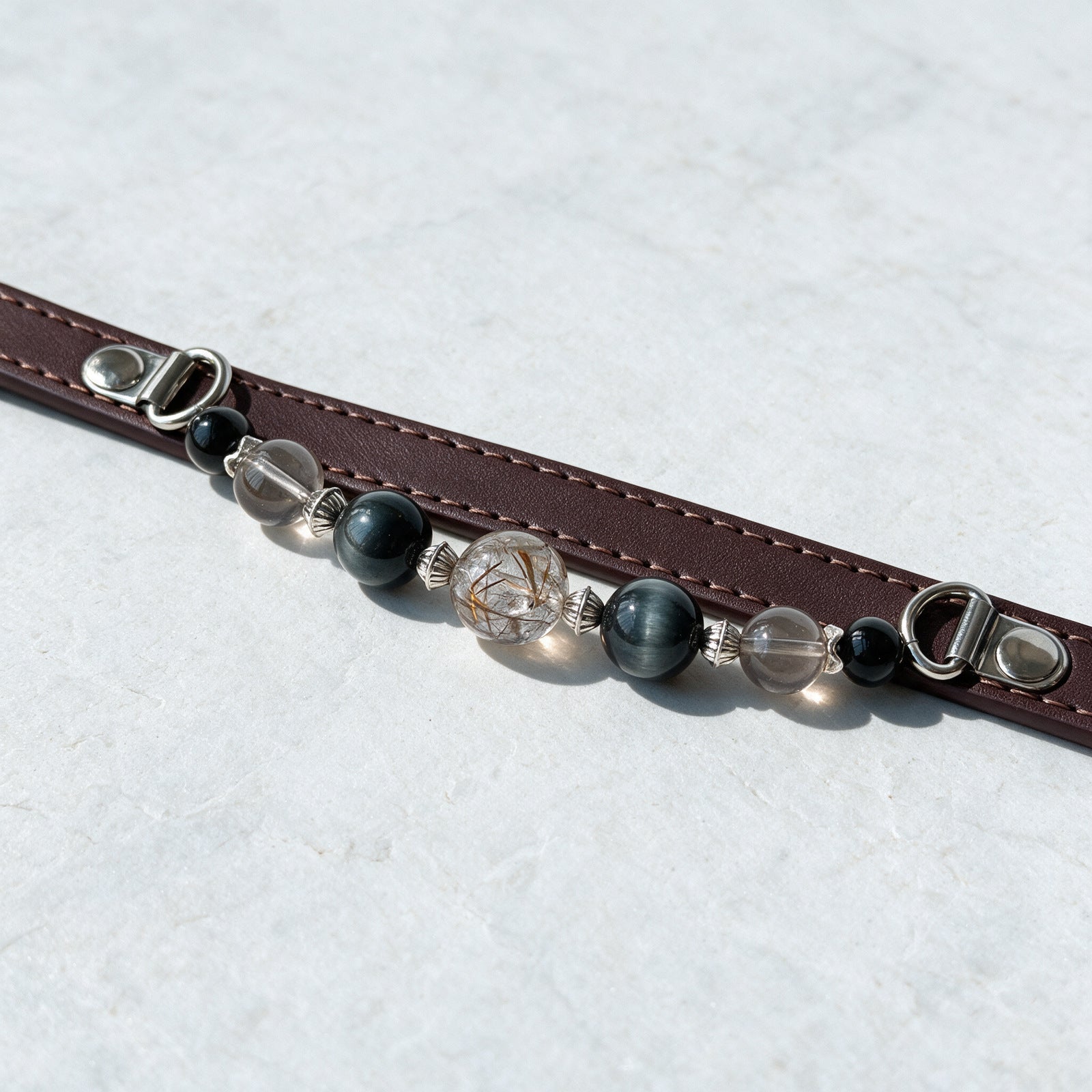 A close view of the Silver Night beads and fittings