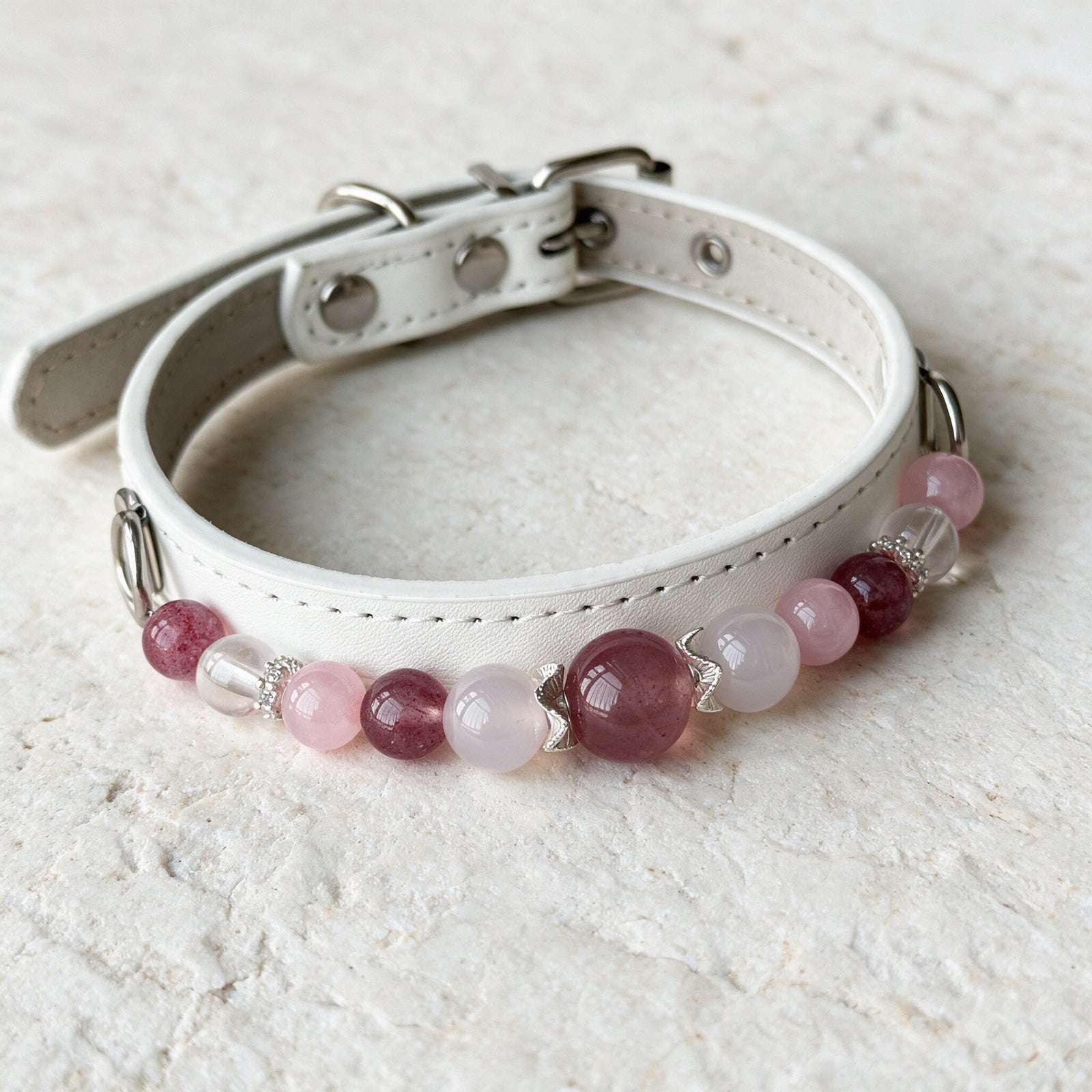 A close view of the Strawberry Cloud beads and fittings