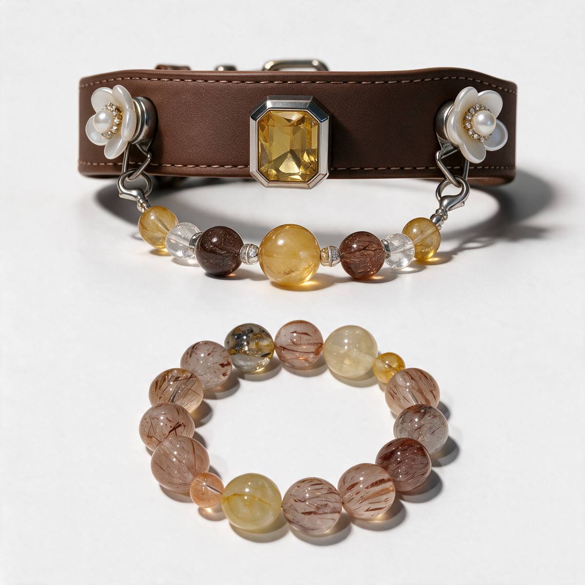 Amber Keepsake matching set with a brown decorative pet collar and coordinating owner bracelet on a near-white background.