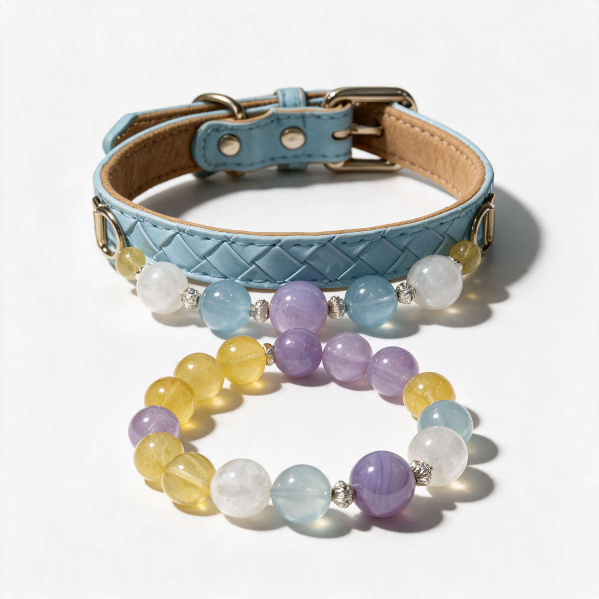 Pastel Morning matching set: pale blue woven dog collar and coordinating multicolored beaded owner bracelet on a near-white background.