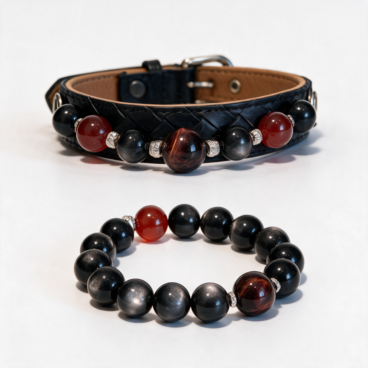 Crimson Bond black woven crystal dog collar and matching red-and-black beaded owner bracelet on a white background.