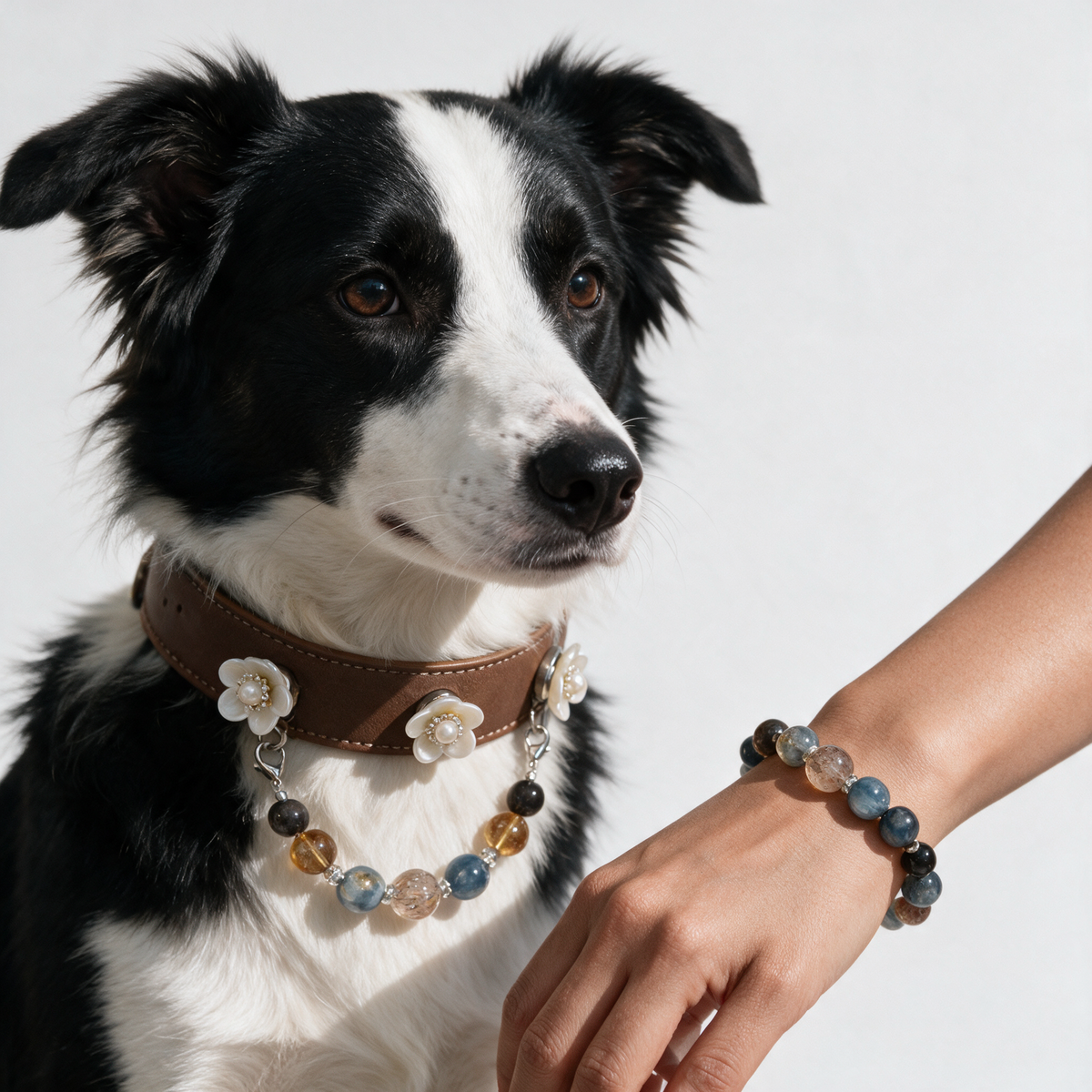 Close view of the Twilight Promise brown floral dog collar and coordinating bracelet, showing white flower accents and blue-gray, amber and dark beads.