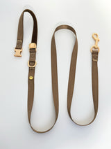 Brown coordinating leash; decorative charms sold separately.