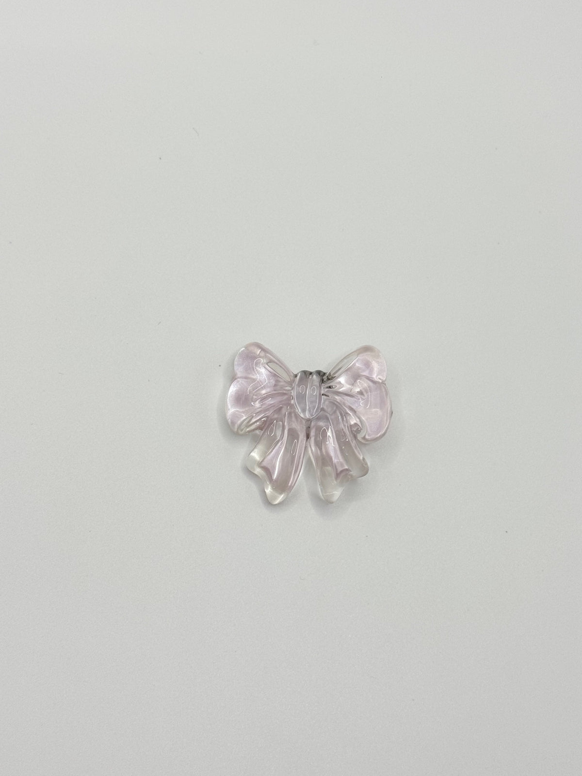 Bow removable decorative charm, sold individually.