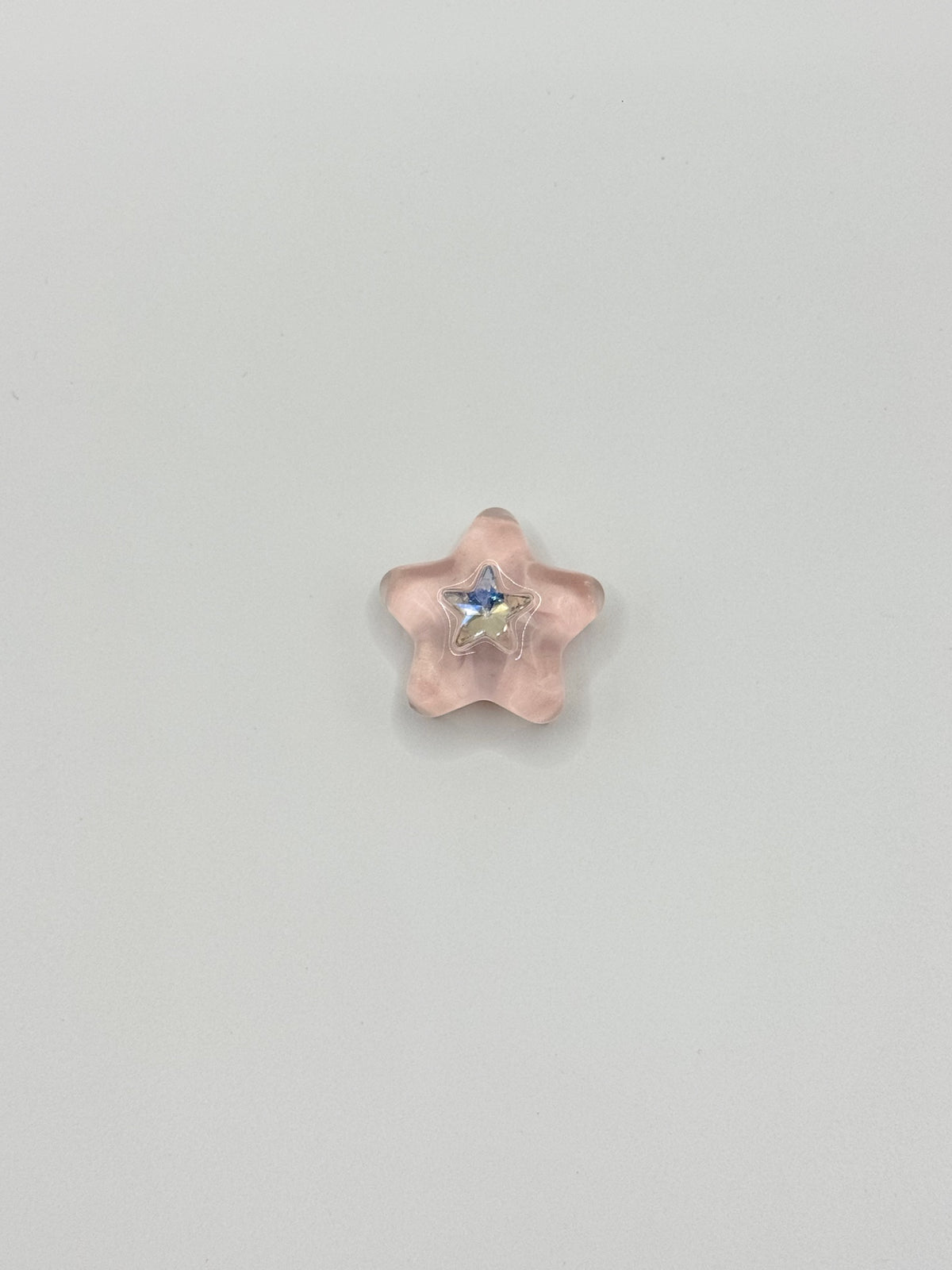 Pink star removable decorative charm, sold individually.