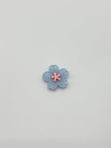 Blue flower removable decorative charm, sold individually.