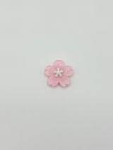 Pink flower removable decorative charm, sold individually.