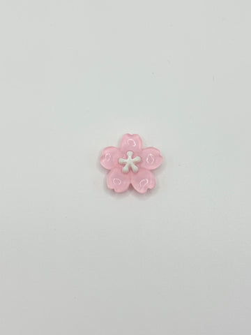 Pink flower removable decorative charm, sold individually.