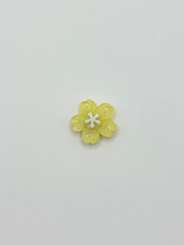 Yellow flower removable decorative charm, sold individually.