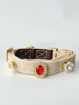 S/M cream buckle collar styled with three charms. Every size includes five selectable charms; extra charms and leash sold separately.