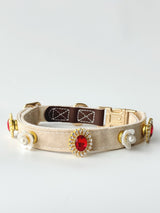 L-size cream buckle collar styled with five charms. Every size includes five selectable charms; extra charms and leash sold separately.
