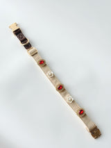 L-size cream buckle collar styled with five charms. Every size includes five selectable charms; extra charms and leash sold separately.